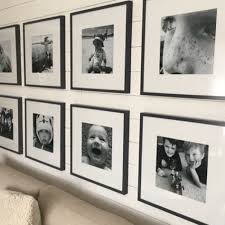 Black And Whites With Ikea Ribba Frames On Shiplap Feature Wall Shiplap Feature Wall Picture Gallery Wall Gallery Wall Frames