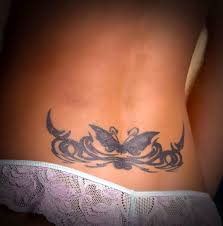 Lower back tribal tattoos are also called tramp stamps (see further). Tramp Stamp Butterfly Tattoo Idea
