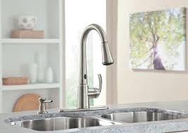 a moen motionsense faucet and soap