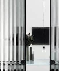 Sliding glass doors also provide a unique and contemporary option when it comes to partition doors. Glass And Glazing Gallery Photos Doors Interior Modern Glass Partition Designs Sliding Glass Door