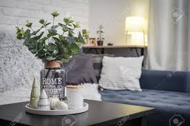 Yes, a coffee table exists for function more than anything. Christmas Decorations With Candle On Coffee Table In Living Room Stock Photo Picture And Royalty Free Image Image 111494706