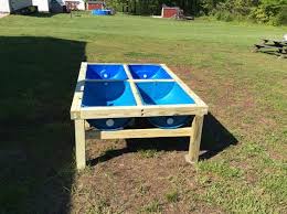 Raised Garden Made From Plastic Blue Barrels And Easy On Your Back Garden Beds Building A Raised Garden Raised Garden