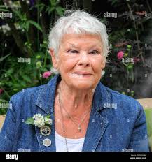 Actress with flowers hi-res stock photography and images