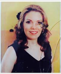 This is my favorite photo of my mother. I would love to see this restored,  if anyone is willing.