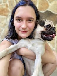 Pig loves being the center of attention in photos