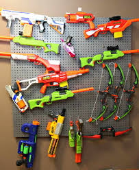 Here is a real simple diy nerf gun storage rack system for under $$20.00 bucks. How To Build A Nerf Gun Wall With Easy To Follow Instructions