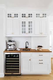 Typical of most homes in the 1930's, the small 14' by 11' kitchen was located in the back of the home and was separated from the rest of the house by long. Beautifully Renovated Dutch Colonial Style Home Nestled In New England