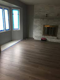 Tore Out The Three Different Types Of Flooring Carpet Laminate And Vinyl In The Entry Living Room Brown Laminate Flooring Vinyl Flooring Kitchen Flooring