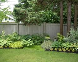 Traditional Perennial Landscaping Along Fence Backyard Fences Fence Landscaping