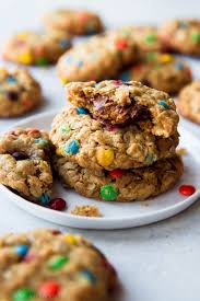 Chocolate and vanilla ice creams, fudge topping, crushed chocolate sandwich cookies and whipped topping are layered for a luscious dessert in our black magic parfait cups recipe. Peanut Butter Cup Surprise Monster Cookies Sally S Baking Addiction