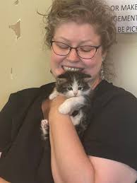 Is this someone's cat? I think it is female. She was timid for months,  until recently she greets us when we come home and let's us pet her. Just  wondering if she