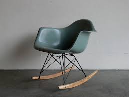 Forward thinking — an experiment as much as an icon, the eames molded shell chair charts the eameses' fascination with emerging materials. Eames For Herman Miller Fiberglass Arm Chair Rocker Rar Eames Rocking Chair Eames Rocking Chair