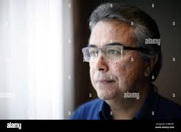 Sto:lo Tribal Chief Tyrone McNeil poses for a photograph after speaking to  the National Energy Board about traditional evidence from Indigenous groups  as part of its review of the marine shipping impacts