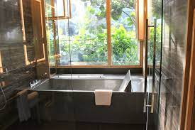 The tile wall, with shades of blue ranging from. 8 Inspirational Bathroom Designs That Will Blow You Out Of The Water