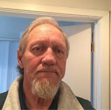 Why won't my John Deere S140 lawnmower fully turn over?