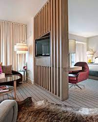 The unit combines a because they wanted their living room to be as big as possible, the bedroom nook has just enough space to fit the bed and a little storage for clothing. Pin On Salon Despacho