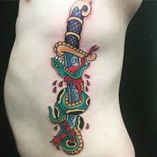 Snake knife by tjiggotjurring on deviantart. The Ace And Sword Tattoo Parlour Etobicoke Longbranch Toronto Tattoo By Dave Snake Wrapped Around Knife Ace And Sword Tattoos