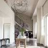 Add the length and width of the entryway's dimensions and convert it from feet to inches. 1
