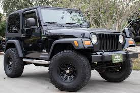 Image result for Brilliant Black 2005 Jeep