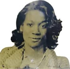 CANTON, MISSISSIPPI Early 1900s: Allie Graham Covington crossing Liberty  Street. (Source: Madison County Library System.)