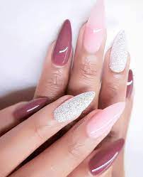 The nails have been painted in a light color and have a purple flower design on the top. 22 Pretty Mismatched Nail Trends For 2020 Nail Art Designs Nail Art Designs 2020 Beautiful Nail Ar Beautiful Nail Designs Nail Art Designs Cool Nail Designs