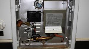 The hot water heater reset is actually a high limit safety thermostat switch that disconnects the power to the water heater if the water exceeds a preset temperature. Rv Water Heater Troubleshooting Tips Rv Repair Club