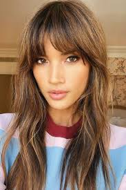 Hairstyles with full bangs and long hair are not lacking, offers them in mahogany red biguine paris for the winter collection. Fringe Hairstyles From Choppy To Side Swept Bangs Glamour Uk