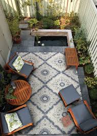 This custom wood deck was designed and constructed by alexi politis, for home depot's diy blog. 4077 6025 Couristan Small Outdoor Patios Small Outdoor Spaces Small Backyard Patio