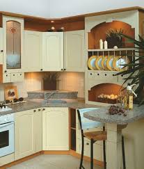 A minimalist kitchen wit graphite grey and orange cabinets looks orange kitchen cabinets with sleek black countertops and chalkboard walls for a family retreat. Orange Kitchen Colors 20 Modern Kitchen Design And Decorating Ideas