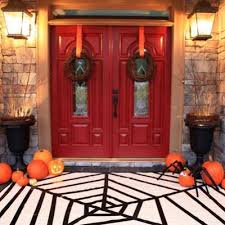 We have a super creepy huge spider living outside our family room window. Spider Web Rug Halloween Decorations To Make Tip Junkie