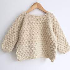 Detailed with a textured bubble effect design to the front, this is an. Bubblewrap Jumper By Brought Up By Wolves Kids Knitting Patterns Knitting Girls Jumper Knitting Pattern