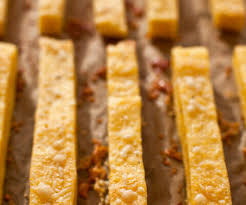 Serve the hot polenta chips with some extra parmesan grated on top, and the pesto dip on the side. Baked Parmesan Polenta Fries Mom S Kitchen Handbook