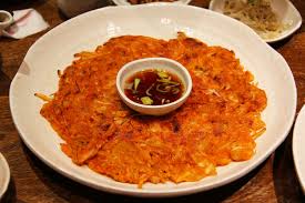 'the dinner, which featured kimchi, a traditional korean dish of hotly spiced chinese cabbage, and clear distilled liquor made in south korea, had a friendly atmosphere, the. Kimchi Buchimgae Wikipedia