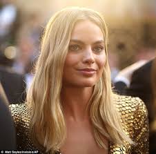 Oscars 2016 red carpet sees Margot Robbie stun in a gold snakeskin gown