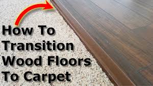 Carpet trim prevents carpet edges from fraying, vinyl floor seams from curling and creates a smooth transition between different flooring surfaces. Carpet To Wood Floor Transition Laminate Floors Youtube
