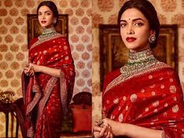 Aishwarya rai bachchan walks the red carpet in a dazzling shade of gold designed by ali younes #cannescollection2016 bolliwood actress #aishwaryaraibachchan wear a dress by ali younes. When Aishwarya Rai Repeated A Sari Worn By Deepika Padukone Times Of India