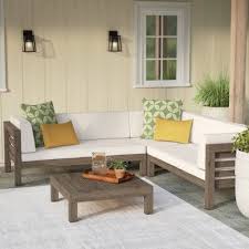 Bayou Breeze Everett 4 Piece Rattan Sofa Seating Group With Cushions Reviews Wayfair In 2020 Seating Groups Outdoor Sectional Sofa Rattan Sofa