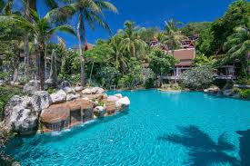 Phuket is the largest island of thailand… phuket beaches phuket is an island with lots of houses Emirates Town Office In Phuket Thailand Airlines Airports