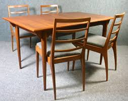 1950s Mcintosh Teak Dining Table And Chairs Elephant Monkey In 2020 Teak Dining Table Dining Table Chairs Rectangular Dining Table