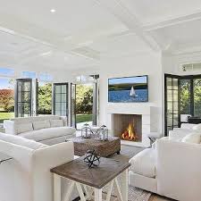 The contemporary living room seen here, features streamlined furniture and oversized colorful artwork. Modern French Living Rooms Design Ideas