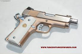 A commander size 9mm with bright polished rose gold pvd slide flats, slide lock, safety, and grip safety. Pin On Gun And Things