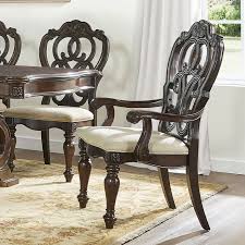 Arm chairs—perfect for both casual and formal occasions, arm chairs elevate the image of your dining table. Royale Dining Room Set By Steve Silver Furniture Furniturepick