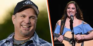 Garth Brooks' Daughter, 27, Draws Attention Flaunting Her Slim Figure &  Fully-Tattooed Arm in Cowboy Outfit