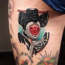 Owl with hourglass tattoo on calf. The Gutter Ghost In The Shell Geisha By Elizabeth Rozaki Facebook