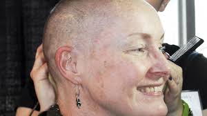 Men, women have heads shaved to raise money for St. Baldrick's Foundation