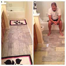 Tile, hammer, wood block, tile spacers, level, paper towels, grout remover tool, and kneepads. Which Direction To Run Tile In The Bathroom