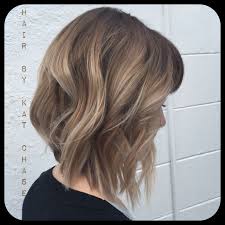 If you thought that rocking a short pixie cut meant you couldn't get in on the ombre look, follow this instagrammer and brighten up your cropped style with some golden blonde and brown hues. Ashy Blonde Ombre Short Hair Novocom Top