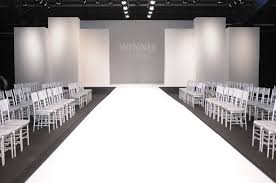The Stage Is Ready For The Models To Walk The Runway And Showcase Winnie Couture S Beautiful Bridal Gowns Catwalk Design Fashion Show Themes Stage Design