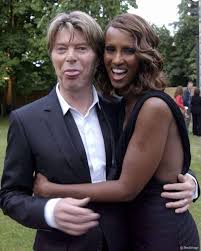 A worker hangs vintage david bowie albums in the window of the vinyl exchange record store in manchester, england, january 11 2016. See This Instagram Photo By David And Gail 255 Likes Iman And David Bowie David Bowie Bowie