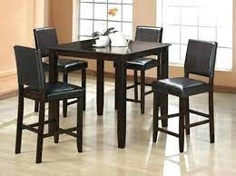 It's crafted from a mix of solid and engineered wood in a light brown and espresso hue that blends in easily with any color palette. Inexpensive Kitchen Table Savillefurniture